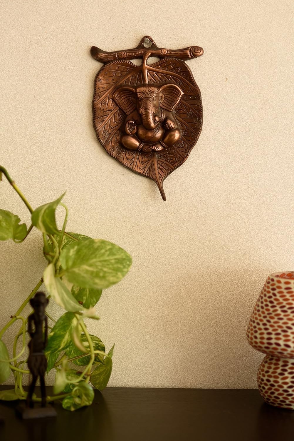 Ganesha Wall Sculpture in Metal with Leaf Design