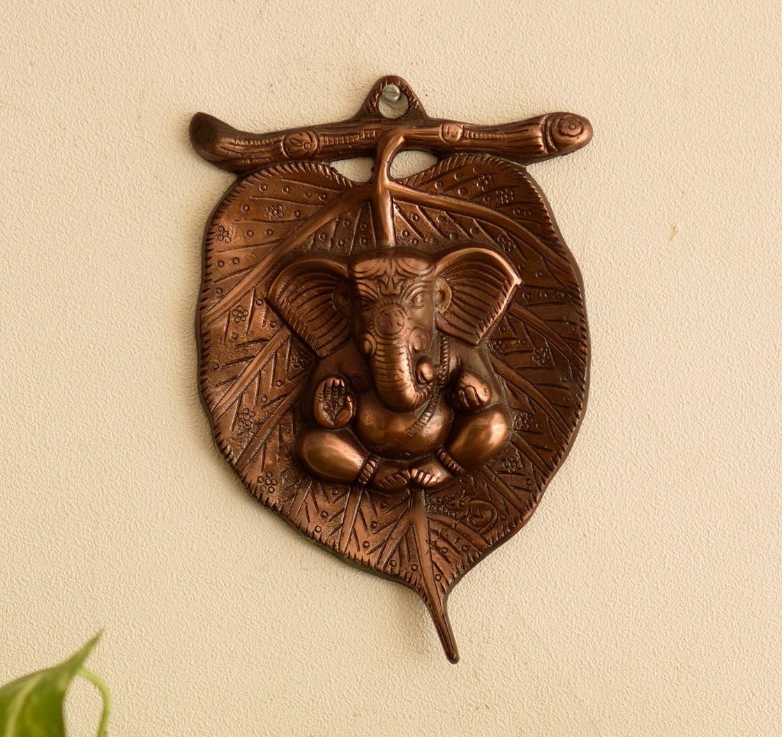 Ganesha Wall Sculpture in Metal with Leaf Design